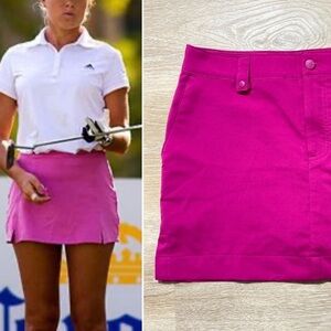 Under Armour Bright Pink Skort Skirt. Golf or tennis skirt with shorts size 8